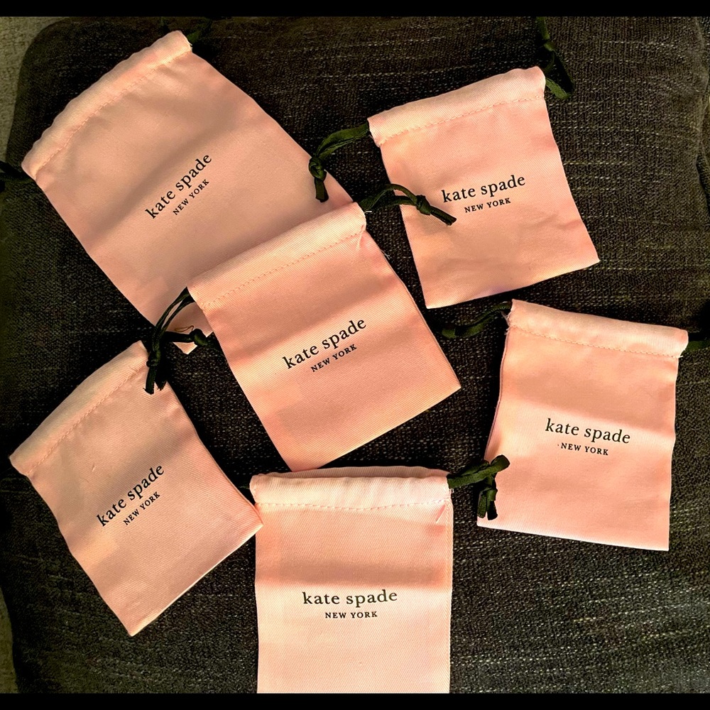 5 small and 1 medium original Kate spade jewelry duster bags - never used.